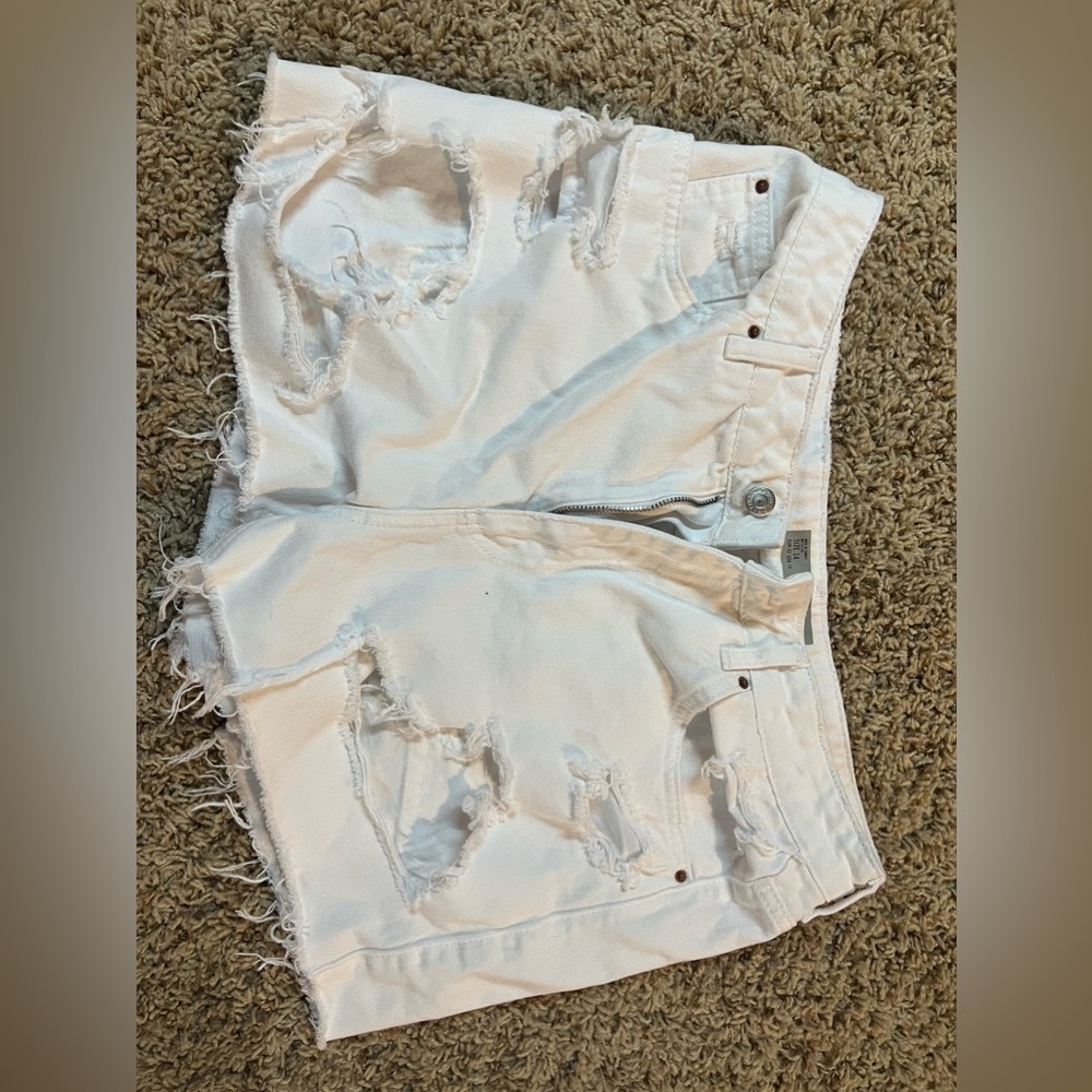 White jean shorts with rips size 14